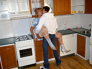 Horny housewife fucking in her kitchen