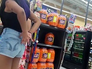 Candid teen in line with shorts