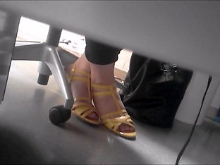 candid feet under desk 2