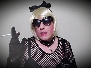 Fetish sissy slut Mandy smokes vs120 in leather gloves